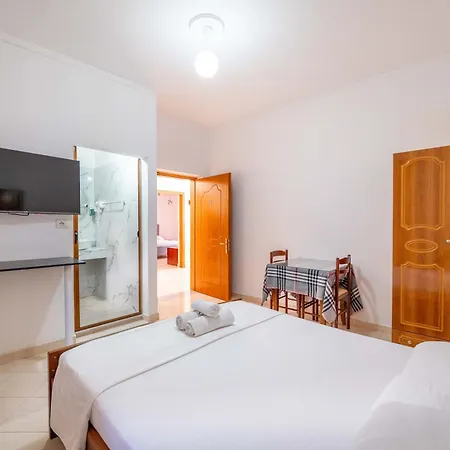 Agim Doko Εξαμίλιο