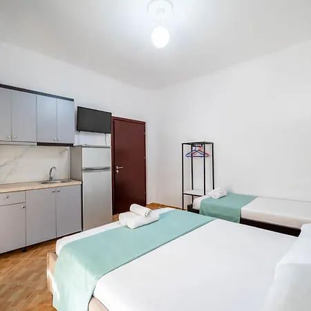 Agim Doko Εξαμίλιο